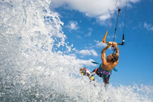 Kiteboard at Belmont Shore: hold on tight as the wind lifts you out of the water