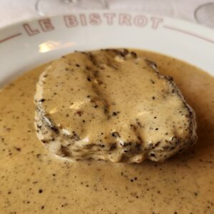 Paris - creamy plate of steak au poivre from Paul Bert