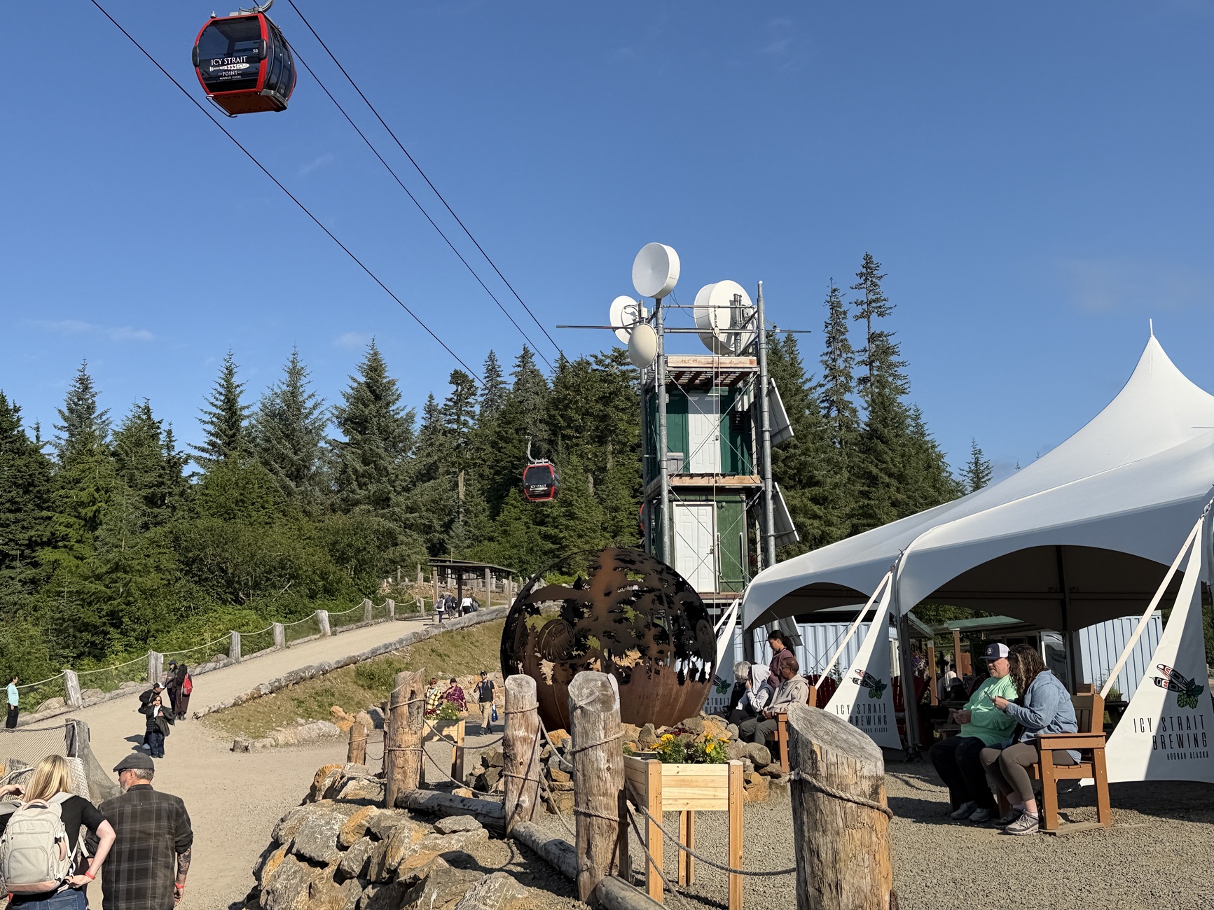 The red SkyGlider gondola to climb up steep Hoonah Mountain is the final leg in the directions to the world's largest zipline on top of Hoonah Mountain.